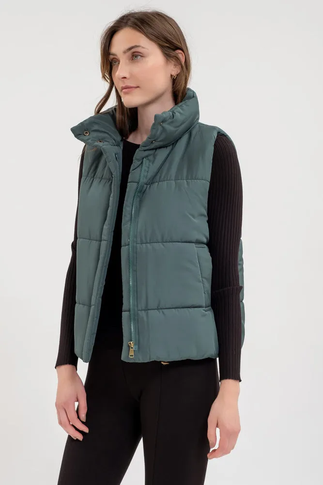 Solid Zip Up Puffer Vest in Hunter Green by Blu Pepper