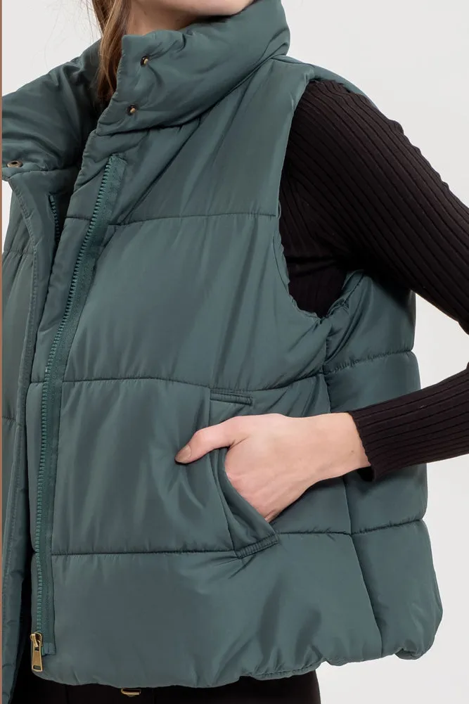 Solid Zip Up Puffer Vest in Hunter Green by Blu Pepper