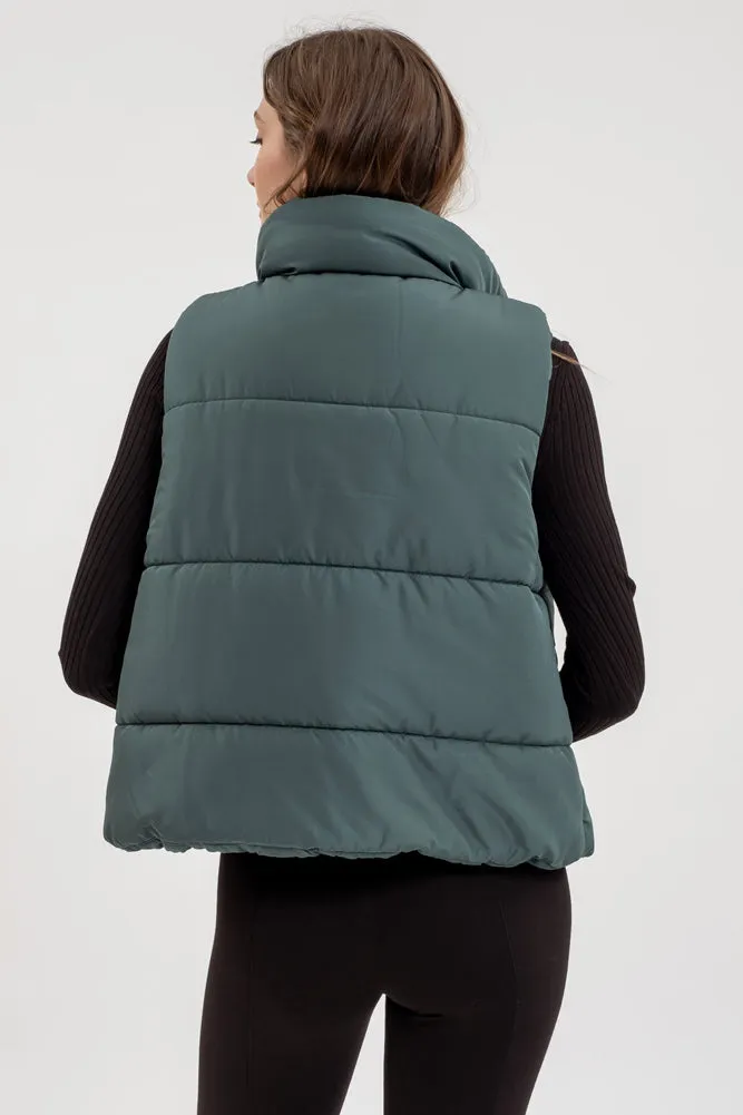 Solid Zip Up Puffer Vest in Hunter Green by Blu Pepper